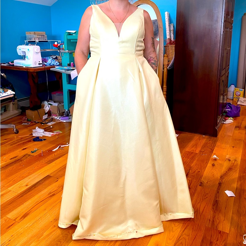 Buttercream yellow prom dress with pockets and corset lace back